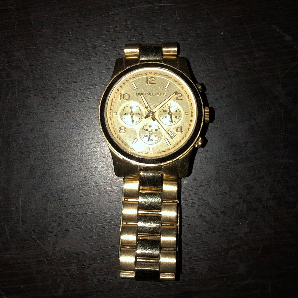 Michael kors women’s gold watch Mk 5055